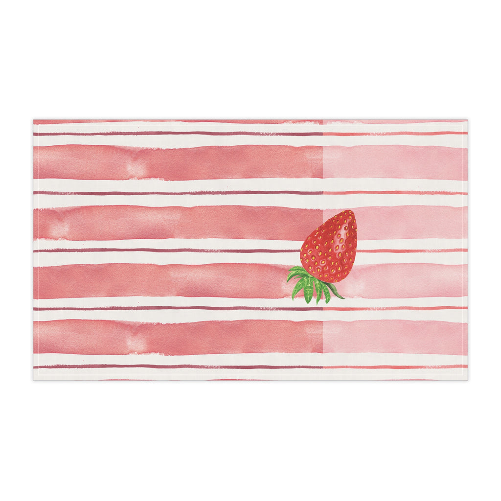 Striped towel with a strawberry design on a white background