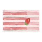 Striped towel with a strawberry design on a white background