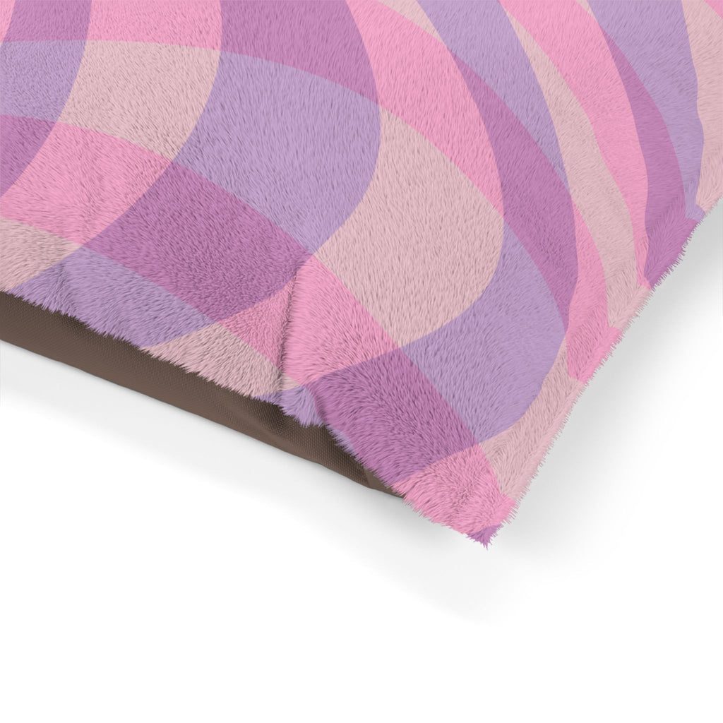 Close-up of a pink and purple checkered fabric with a white background